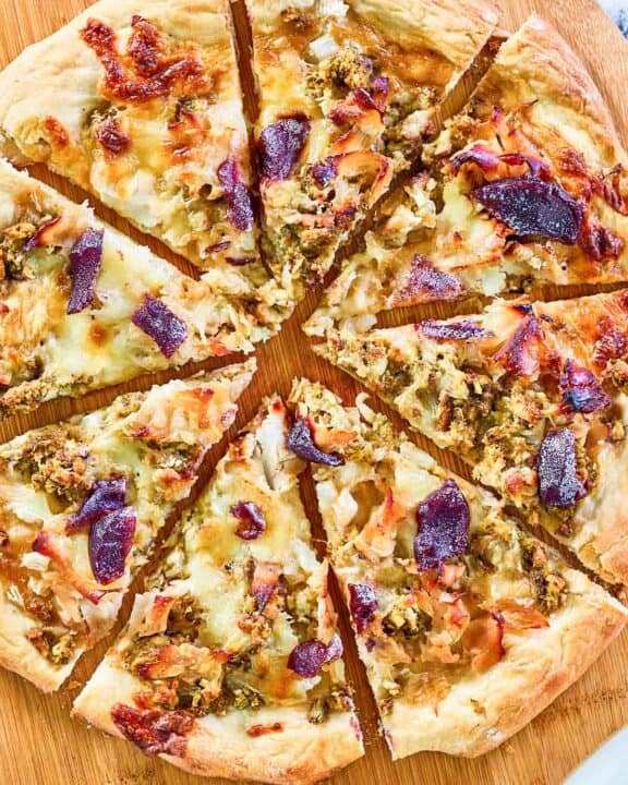 overhead view of Thanksgiving pizza on a pizza peel.