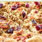 Thanksgiving pizza on a pizza peel.