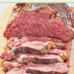 beef tenderloin roast slices on a cutting board.