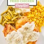overhead view of homemade Cracker Barrel chicken fried chicken, gravy, and vegetables.