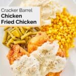 overhead view of homemade Cracker Barrel chicken fried chicken and gravy.