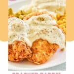 homemade Cracker Barrel chicken fried chicken with gravy on a plate.