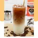 Homemade Dunkin iced caramel macchiato and coffee beans.