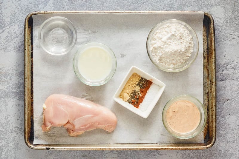 Outback Steakhouse bloomin fried chicken ingredients on a tray.