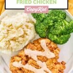 overhead view of homemade Outback bloomin' fried chicken and vegetables.