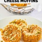three homemade Starbucks pumpkin cream cheese muffins topped with pumpkin seeds.