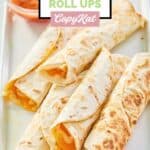 five homemade Taco Bell cheesy roll ups on a platter.