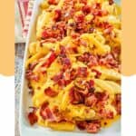 homemade Wendy's baconator fries on a platter.
