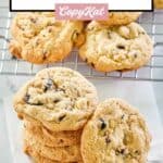 white chocolate cranberry cookies in a stack and one next to it.