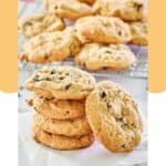 white chocolate cranberry cookies in a stack and on a wire rack.