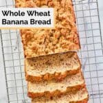 overhead view of whole wheat banana bread on a wire rack.