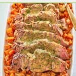 slices of yankee pot roast topped with gravy on a platter.
