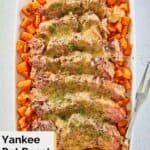 overhead view of yankee pot roast, vegetables, and gravy on a platter.