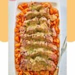overhead view of yankee pot roast, carrots, and gravy on a platter.