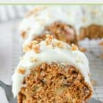 slice of apple spice bundt cake with cream cheese frosting.