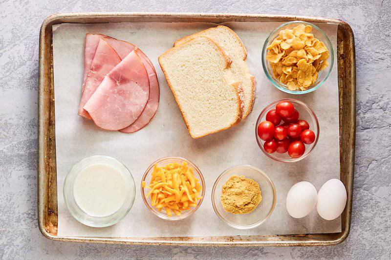 breakfast strata ingredients on a tray.