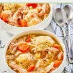 chicken and dumplings in white bowls.
