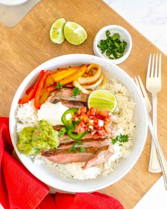 overhead view of copycat Chipotle steak bowl with rice and veggies.