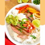homemade Chipotle steak bowl with rice and burrito toppings.