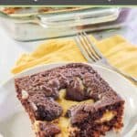 slice of German chocolate earthquake cake on a plate and a fork.
