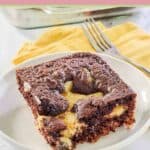 slice of German chocolate earthquake cake on a plate.