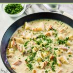 clam chowder topped with fresh parsley.