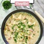 overhead view of clam chowder garnished with fresh parsley.