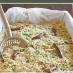kitty litter box cake in a pan lined with a bag.