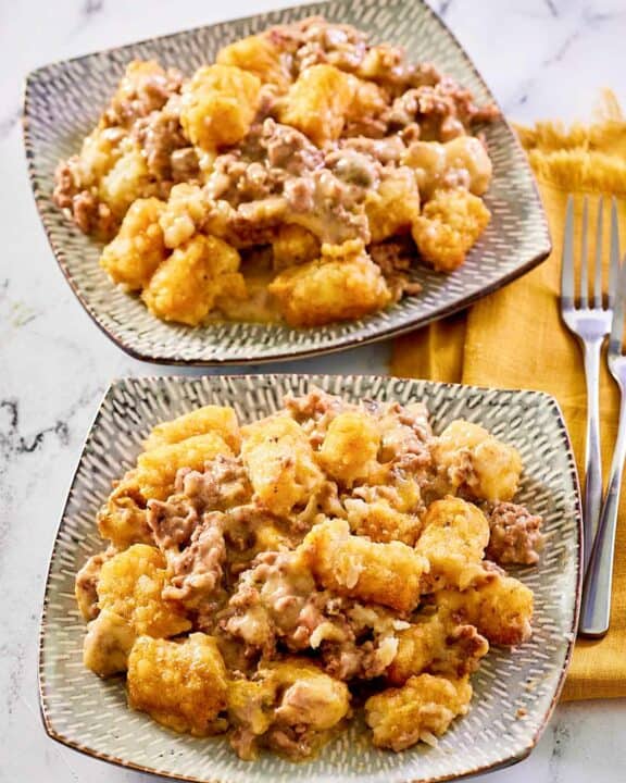 Mexican tater tot casserole on two plates.