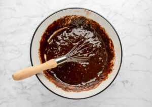 milky way brownie batter in a mixing bowl.