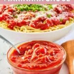 homemade Olive Garden marinara sauce in a bowl and over spaghetti.