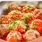 closeup of homemade Olive Garden meatballs and marinara.