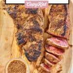 overhead view of homemade Outback steak seasoning and steaks on a wood board.