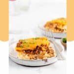 two sour cream noodle bake servings on plates.