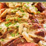 sliced steak marsala with sauce on a platter.