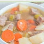 homemade Campbell's vegetable beef soup in a white soup bowl.