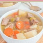homemade Campbell's vegetable beef soup in a white bowl.