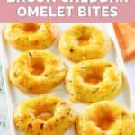 six homemade Dunkin bacon cheddar omelet bites on a tray.