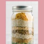 a mason jar with friendship soup mix in it.