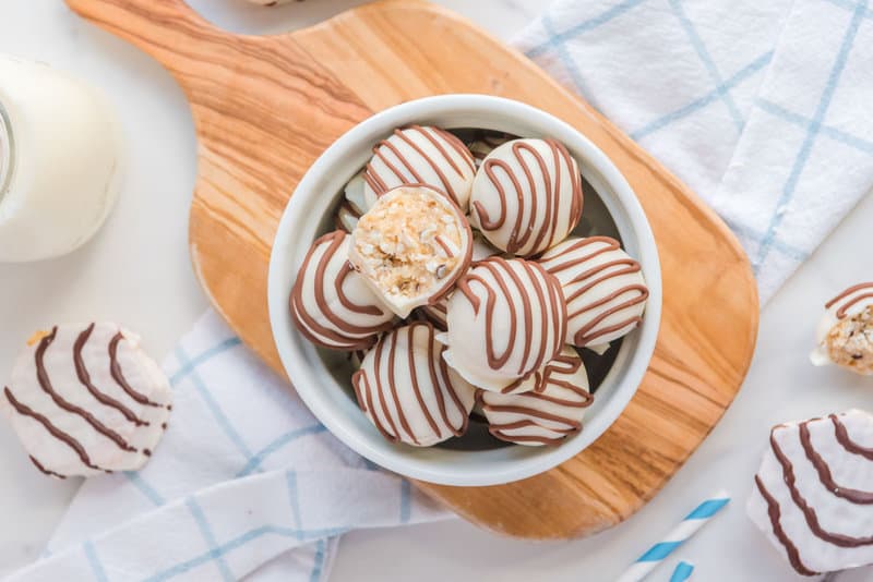 overhead view of Little Debbie zebra cake truffles in a white bowl.
