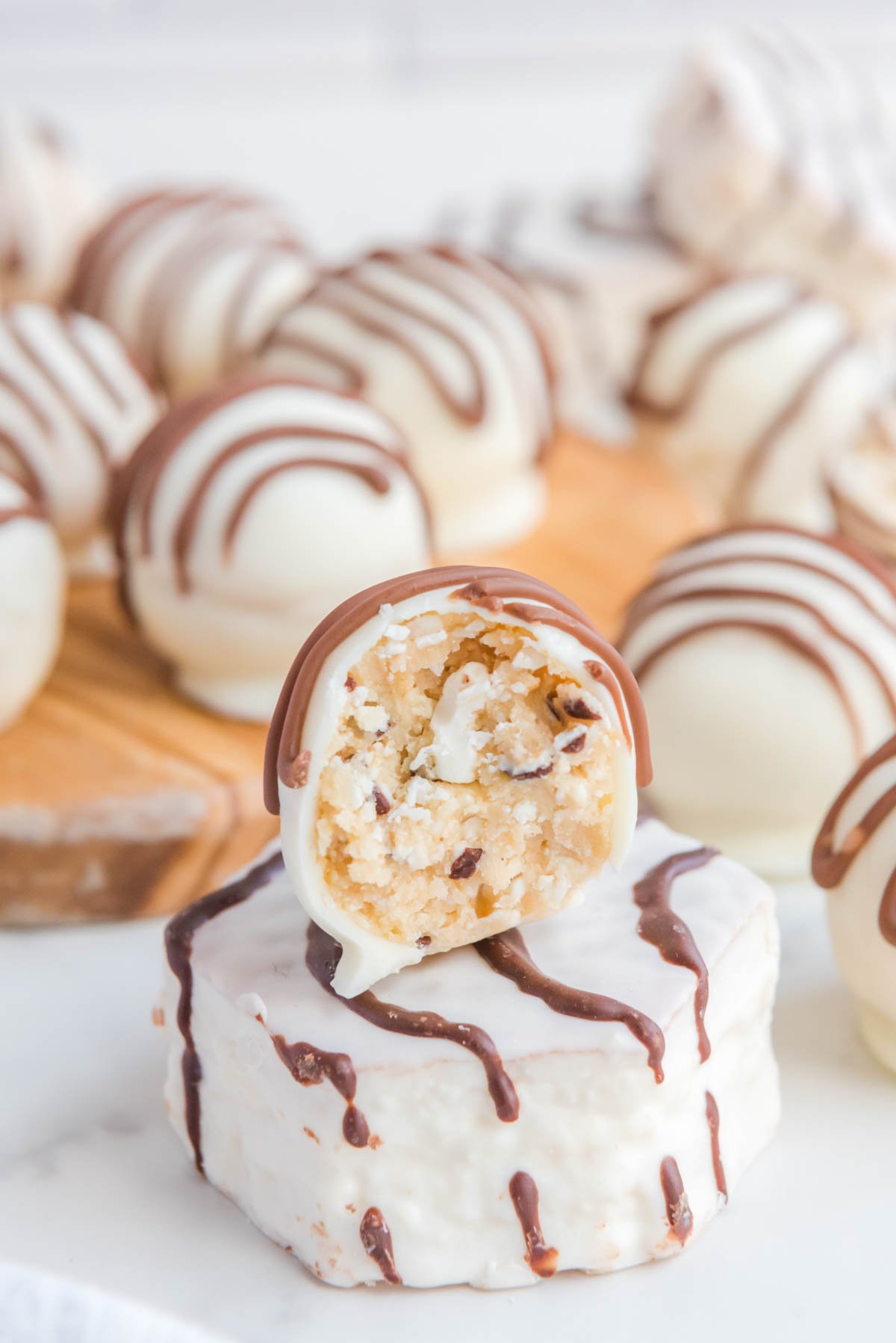 Little Debbie zebra cake truffle on top of a zebra cake.