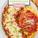 overhead view of homemade Olive Garden eggplant parmigiana and pasta on a plate.