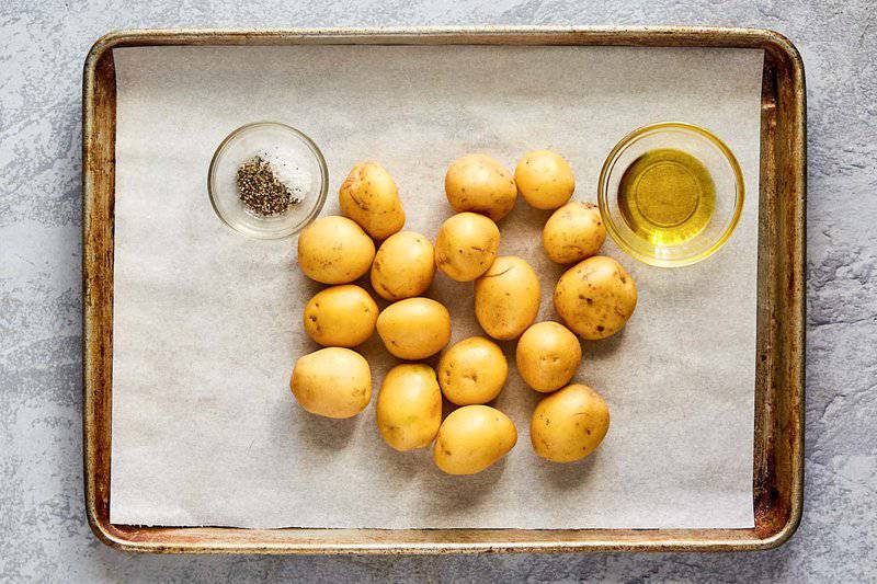 roasted baby potatoes ingredients on a tray.