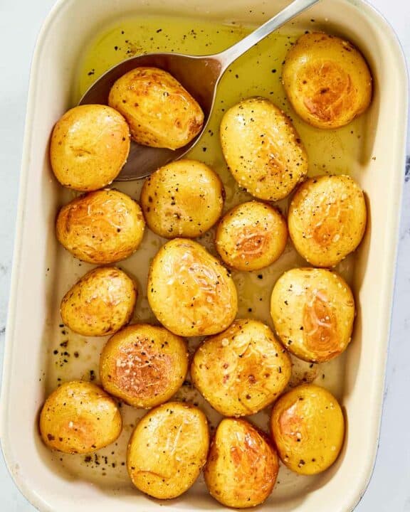 overhead view of roasted baby potatoes in a dish.