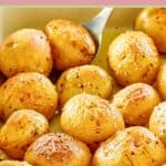 closeup of roasted baby potatoes in a dish.
