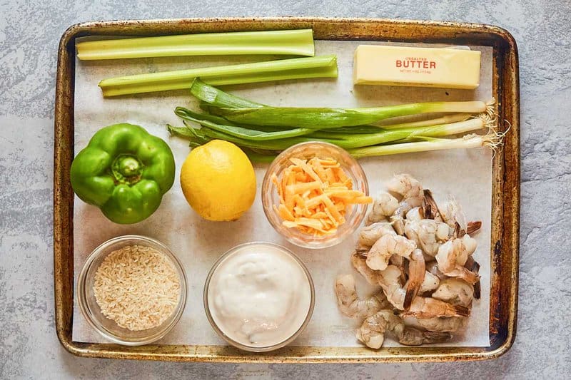 shrimp casserole ingredients on a tray.