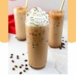 three homemade starbucks iced sugar cookie latte drinks.