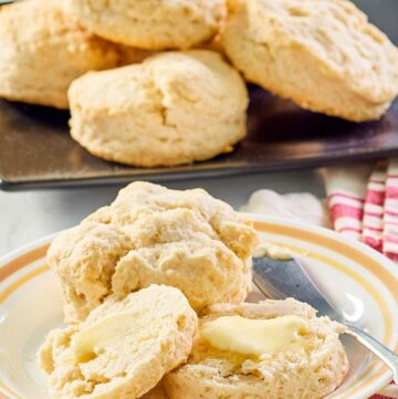 sweet biscuits on a white plate and black platter.