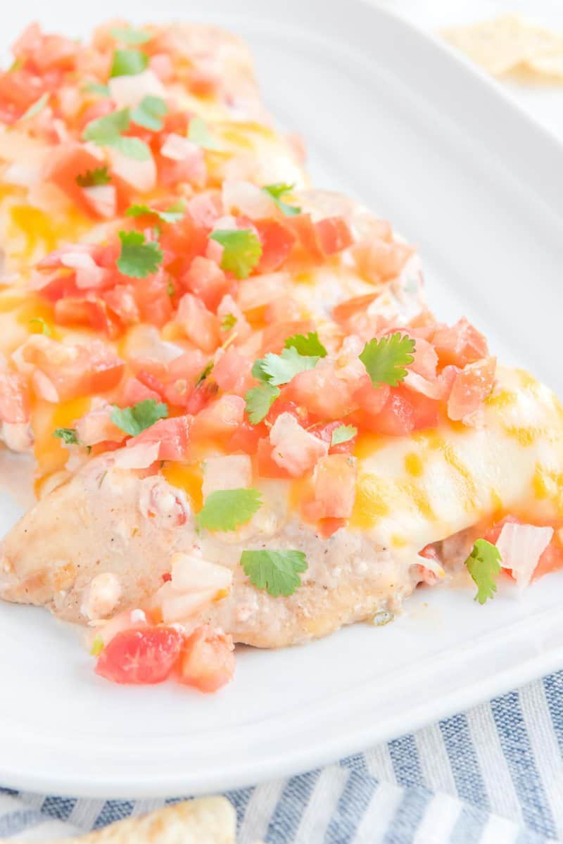 Copycat Applebee's fiesta lime chicken topped with Pico de Gallo.