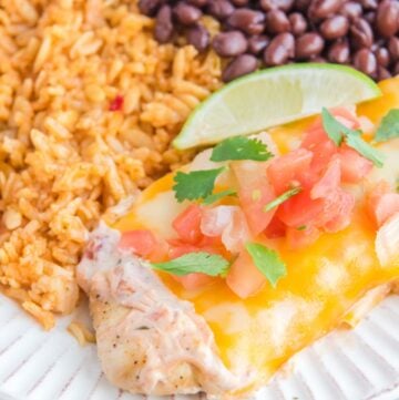 Copycat Applebee's fiesta lime chicken, rice, and black beans on a plate.